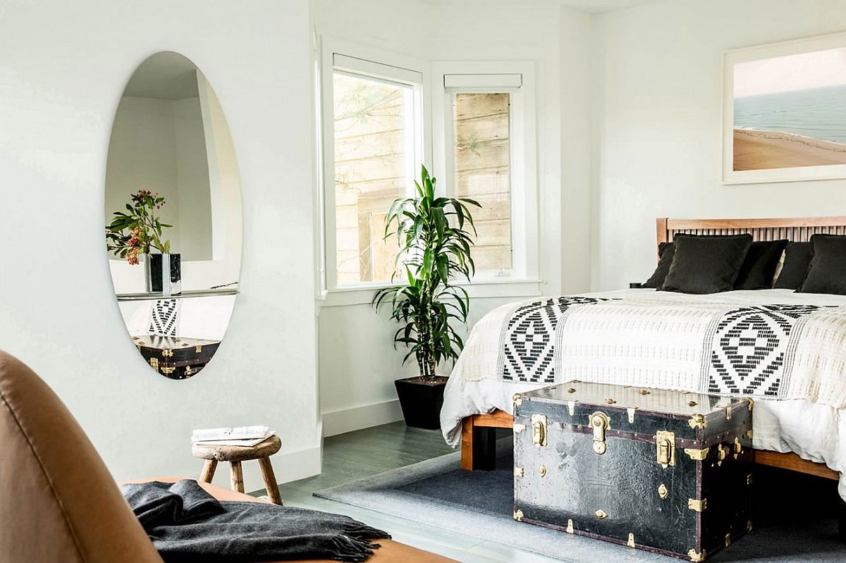Vintage-trunk-turned-into-a-table-at-the-end-of-the-bed.jpg